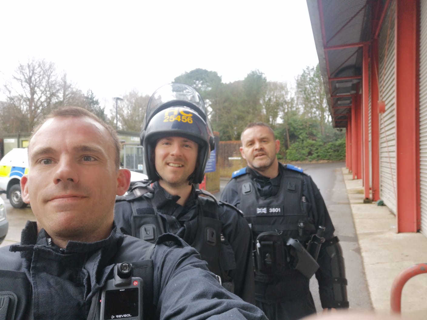 A selfie of three officers