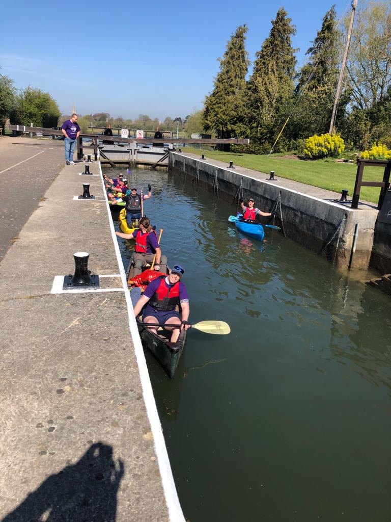 Kayakers in a lock waiting for it to be opened