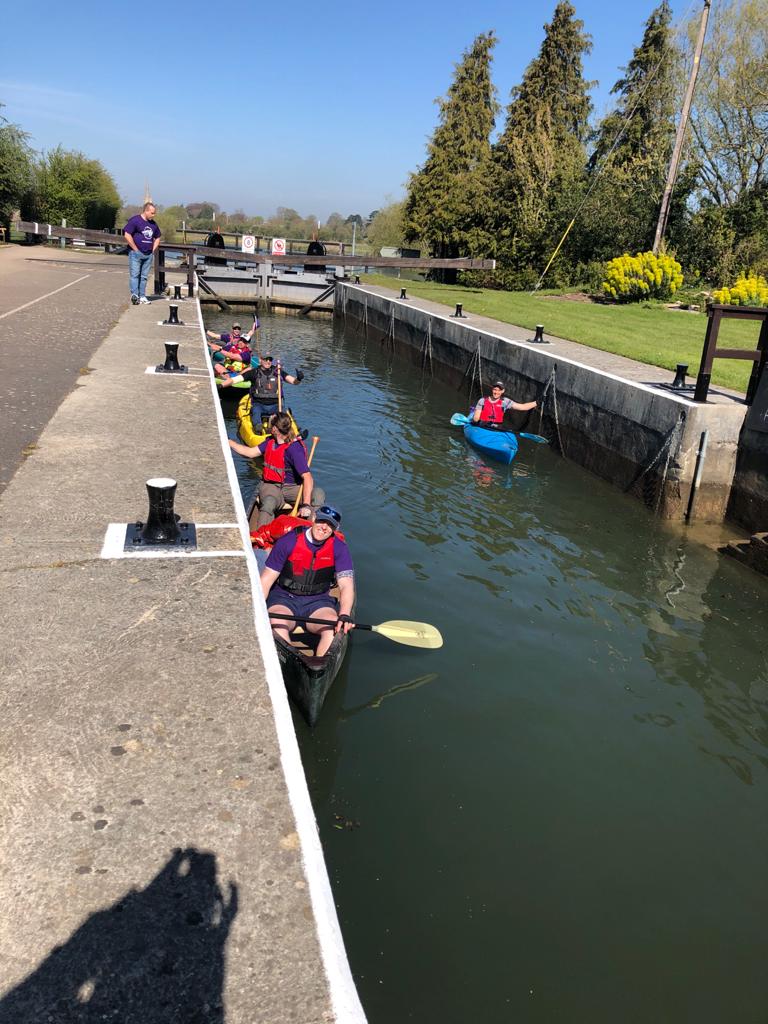 Kayakers in a lock waiting for it to be opened